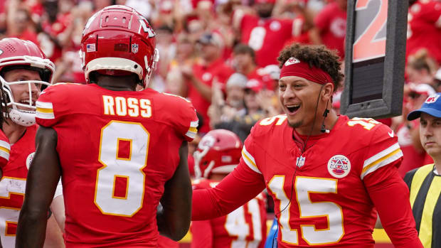 Aug 26, 2023; Kansas City, Missouri, USA; Kansas City Chiefs wide receiver Justyn Ross (8) celebrates with quarterback Patrick Mahomes (15) scoring a touchdown against the Cleveland Browns during the first half at GEHA Field at Arrowhead Stadium. Mandatory Credit: Denny Medley-USA TODAY Sports  